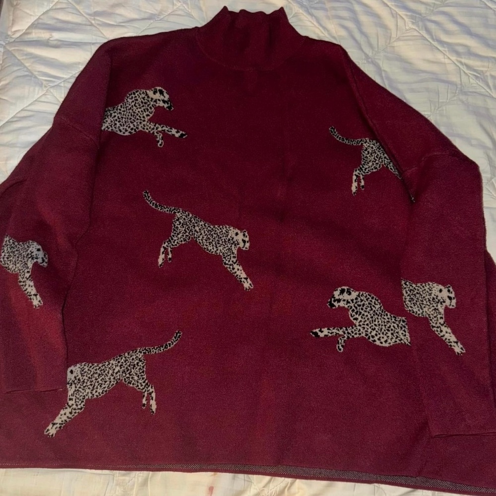 Entro mock turtle neck tunic in maroon with cream and black cheetahs.